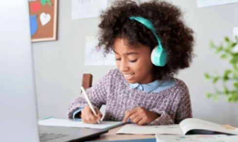 Child is practicing on an audio test